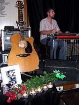 Nick Summers next to Les Scott's guitar