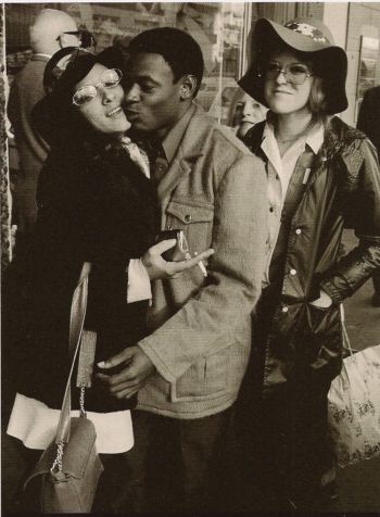 King's Cross Photographer with smoking dolly bird in the 70s